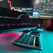 A desk with a keyboard and a monitor