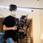 a person holding a camera