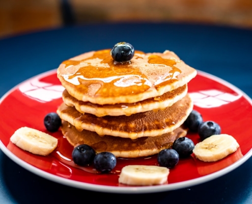 baked pancake with blueberry and slice of banan