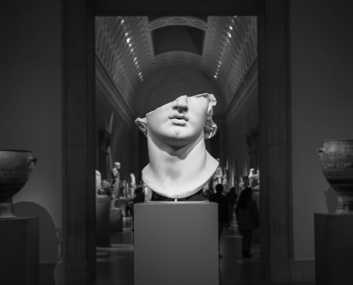 grayscale photo of woman statue