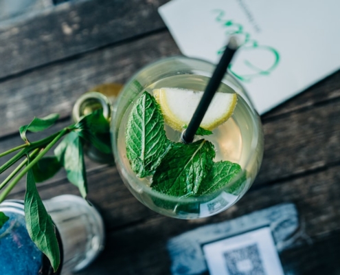green leaf in clear glass cup