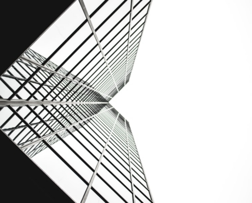 low angle photo of mirror glass building
