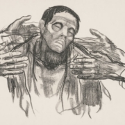 Man with eyes closed, hands holding him