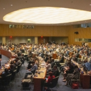 people sitting on chairs inside building