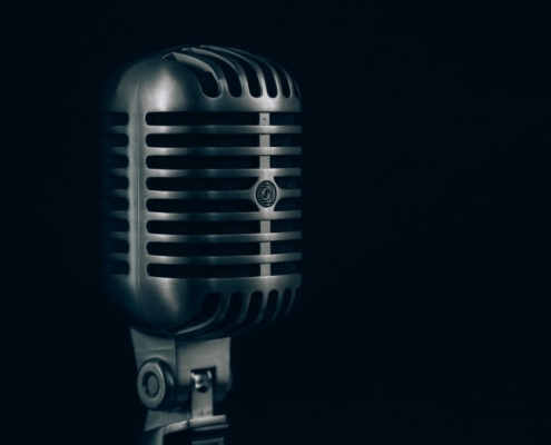 shallow focus photography of condenser microphone