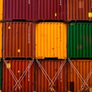stack of red green and yellow wooden crates