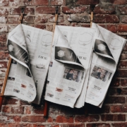 three newspapers
