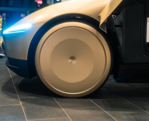 A close up of a robot on a tiled floor