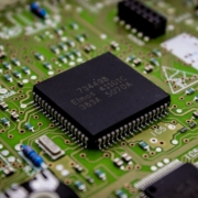 a close up of a computer chip on a printed circuit board