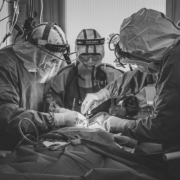 a group of doctors performing surgery in a hospital
