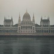 a large building with a clock on the top of it