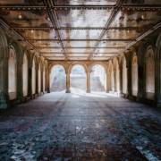 a large room with a lot of columns and arches