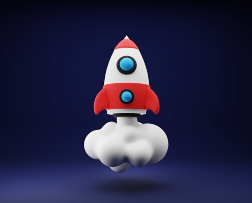 a red and white toy rocket on a blue background