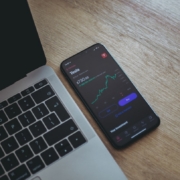 black android smartphone on macbook pro