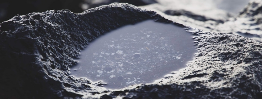 gray stone filled with water