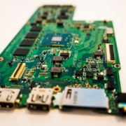 green circuit board on white table