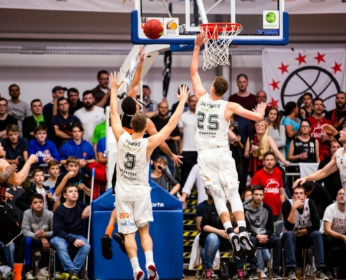 men playing basketball