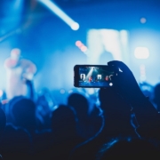 person taking picture on stage