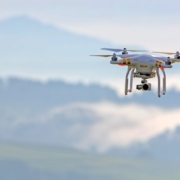 shallow focus photo of white quadcopter