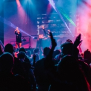 woman singing on stage