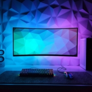 a computer monitor sitting on top of a desk