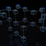 a group of cubes that are on a black surface