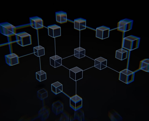 a group of cubes that are on a black surface