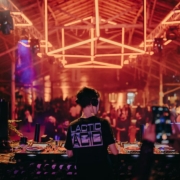 a person standing in front of a dj booth