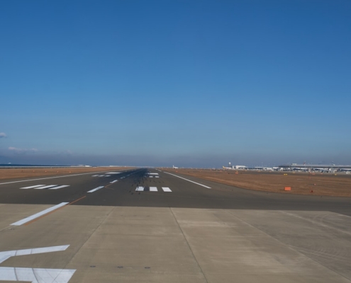 black asphalt road under blue sky during daytime