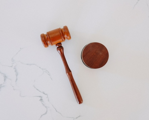 brown wooden smoking pipe on white surface