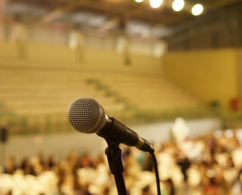 shallow focus photo of black corded microphone