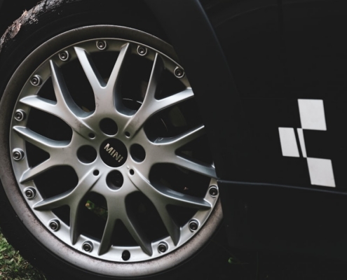 silver 5 spoke wheel with tire