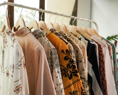 white and brown floral long sleeve shirt