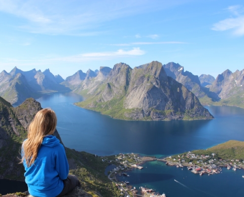 woman sitting on a cliff