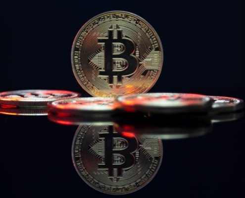a bit coin sitting on top of a table