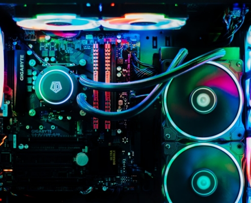 a close up of a computer motherboard in a dark room
