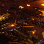 a close up of a computer motherboard with yellow lights