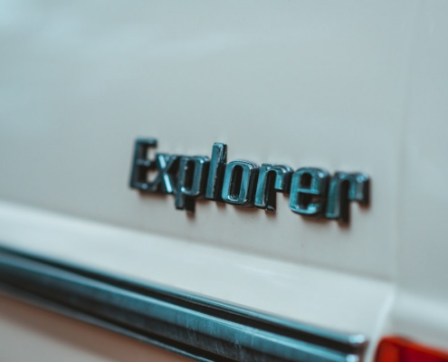 a close up of the word explorer on the back of a car