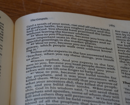 A close up of an open book on a table