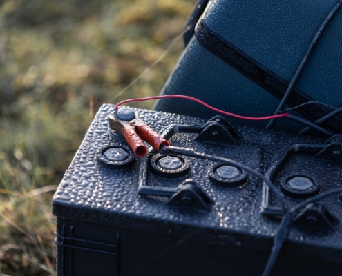 A close up of an electronic device in the grass