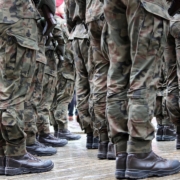 a group of military men standing next to each other