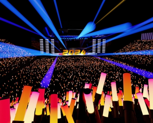 a large group of people standing in front of a stage
