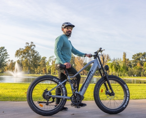 a man in a helmet is riding a bike