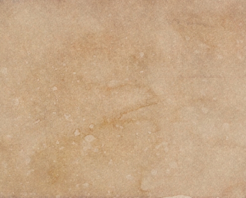 a piece of paper with a brown background