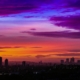 aerial photography of city with high-rise buildings during night time