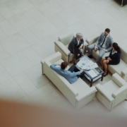 Business people meeting in a modern office lobby