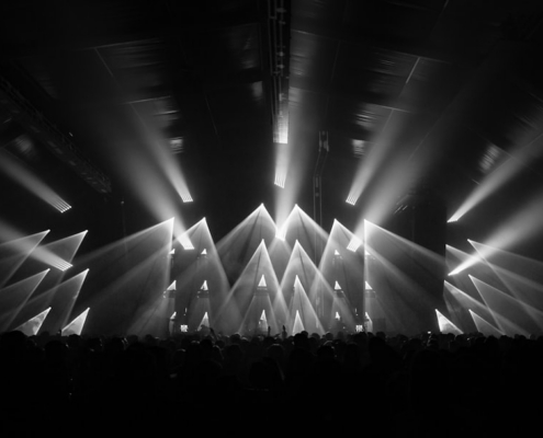 grayscale photography of stage with lights
