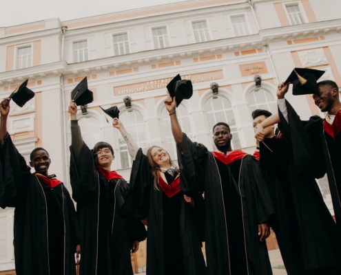 group of people wearing black academic dress