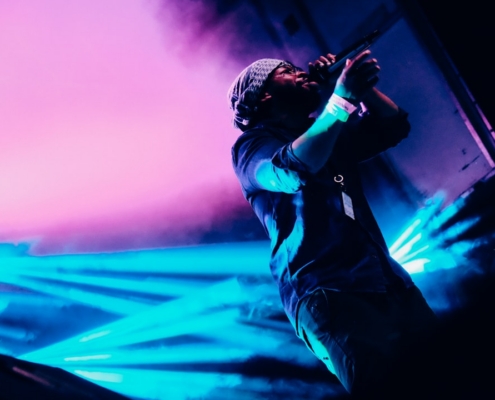 man holding wireless microphone