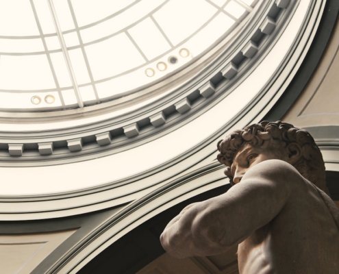 man themed statue inside dome building